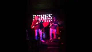 Neil Burnie alongside bandmates Bones at Jan 17th Concert