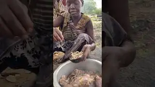 Hadzabe tribe little beautiful kid eating toughest baboon intestine 🍖‼️ #tribal #africa #lyunaff