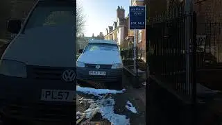 The van parked outside the house