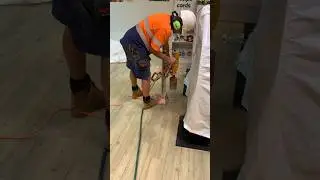 Drilling a Hole in a Wood Floor