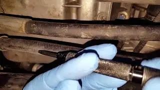 Remove Broken Oil Pan Bolts From the BMW Engine Block.