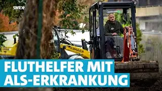 Flut-Helfer mit ALS hilft mit Bagger an der Ahr