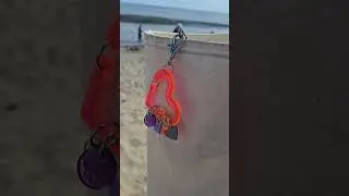 no more losing stitch markers into the sand. my stitch marker holder charm fits on my beach bag!