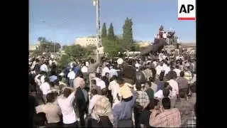 GWT: Celebrating Kurds tear down Saddam statue