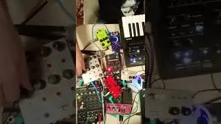 Pile of pedals on my desk making noisy synth music