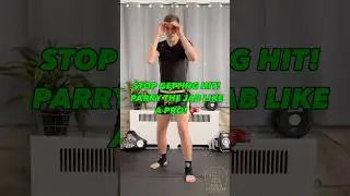 Stop Getting Hit! Parry The Jab Like A Pro 🥊 | Muay Thai Defense In 17s #muaythaishorts #shorts
