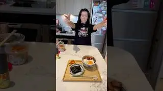 Making a lazy-girl Spam and egg rice bowl