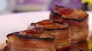deer meat wrapped in bacon, stuffed with whipped Cream cheese, diced Peppers and sausage.