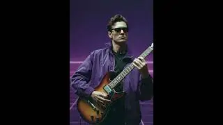 intense guitar solo where the guitar player leans back while looking at his guitar, then leans back