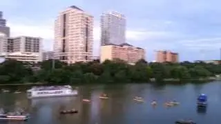 Bats flying from the Anne W. Richards Congress Avenue Bridge at Austin, Texas
