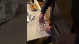 Making foil boats for grilling fish.