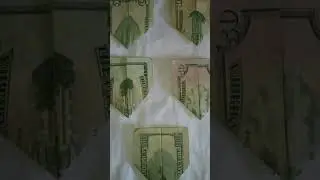 Twin Towers Destruction Illustrated on Folded US Currency