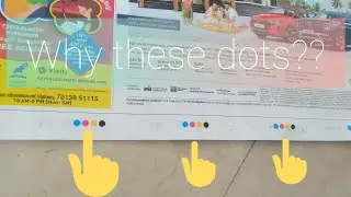 Why four coloured dots at the bottom of every news paper?