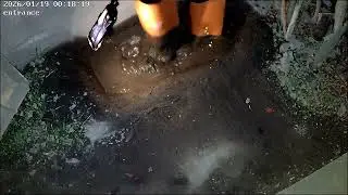 Muddy orange pvc boots 