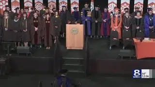 RIT grads walk the stage at the Gordon Field House