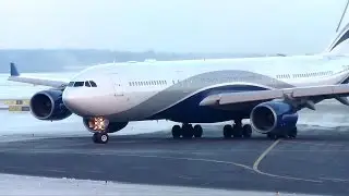 HiFly A340-500 CS-TFX snowy takeoff from Helsinki Airport