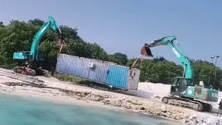 Els company | Container loading and transport system maldives | kobelco excavator loading container