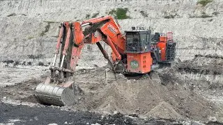 Hitachi Ex 2600 large excavator loading sand material into Dumper - miningstory