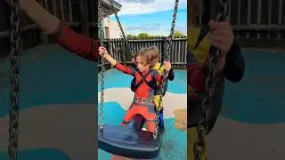 Brother best friends playing in the park playground for kids