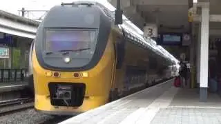 VIRM 9406 vertrekt uit Station Amsterdam Zuid