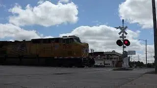 UP 7039 Leads A WB Manifest Through 26th Street Crossing Columbus, Nebraska