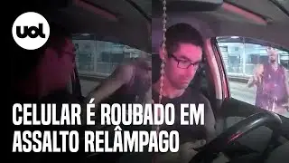 Motorista usa celular ao parar no sinal e &eacute; roubado em 4 segundos