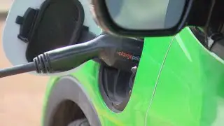 What are the obstacles that Saskatchewan needs to overcome for electric vehicles?