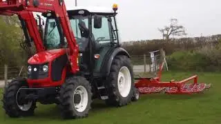 ArmaTrac 504E tractor harrowing and rolling