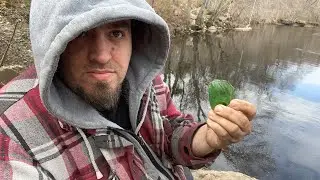 Flint Knapping green glass at the river