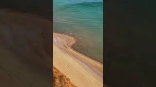 Aerial View Of Beach Waves