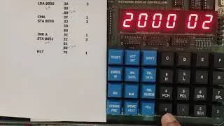 2s compliment of 8 bit number on microprocessor kit