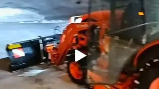 Plowing snow with Kubota lx2620 HSDC cab tractor Titan plow.