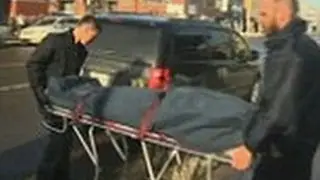 Woman strangled to death when scarf gets caught in escalator