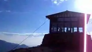 Fire lookout over Swiftcurrent Pass