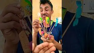 cotton candy 🍭 yummy lollipop #yummycandy#cocunut#elaicheez#pulse#eclairs#parle_g #orange#shortfeed