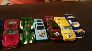 16 fake race cars  race down a ramp!  (faster ramp )