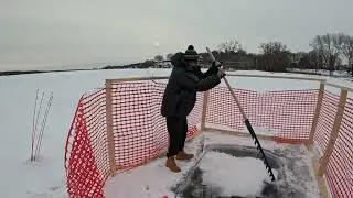 Using an ice saw to cut open the hole! 0 degree windchill cold plunge - WaddlersOfWayzata