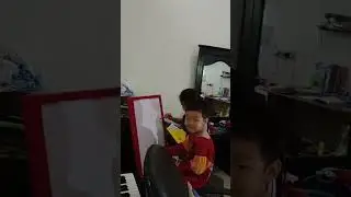 Teacher Adrienne teaches Elfando the body parts 2022