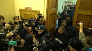 Russian activists back in court for controversial 'terror' trial | AFP