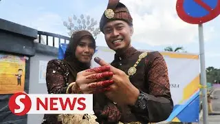 Sg Bakap Polls: Groom casts vote on wedding day