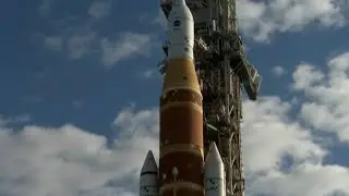 NASA hauls Artemis II moon rocket to launch pad for February flight