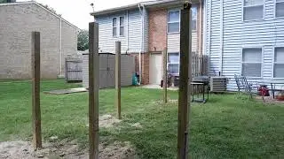Installing wooden fence in back yard 4x4x8 with high strength concrete
