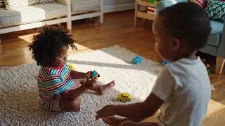 Kindness in Action: The Generous Child Sharing a Toy