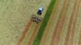 New Hollands making bales In Ballyhoulihan