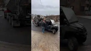 Polaris ranger xp and stone slinger used to transport soil on jobsite