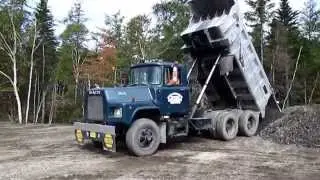 Mack Dump Trucks in Action