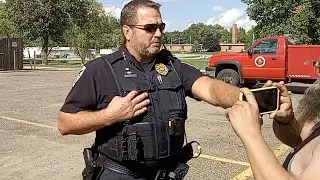 Marquette Heights Chief of Police Assaults 2 Citizens