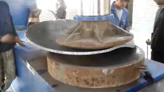 dish end pressing