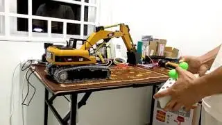 Rc Excavator using linear actuator system.