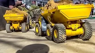 RC 6x6 dump trucks BELL at construction site work! RC-Glashaus action!